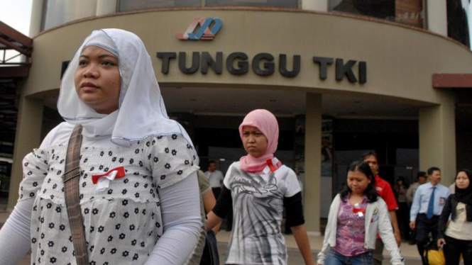 Ilustrasi pekerja migran Indonesia saat baru pulang dari luar negeri.