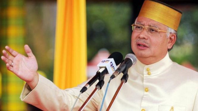 Mantan Perdana Menteri Malaysia, Najib Tun Abdul Razak, berpakaian khas Gowa