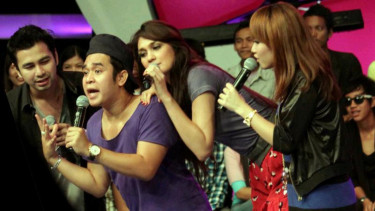 Almarhum Olga semasa hidup.