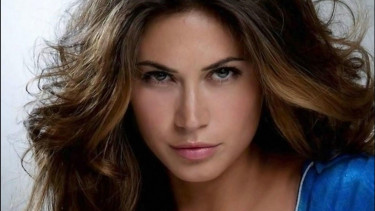 Melissa Satta saat jadi model body paint Sports Illustrated