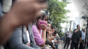 Ilustrai warga pakai masker.