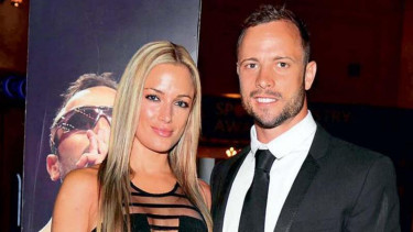 Oscar Pistorius dan kekasihnya, Reeva Steenkamp