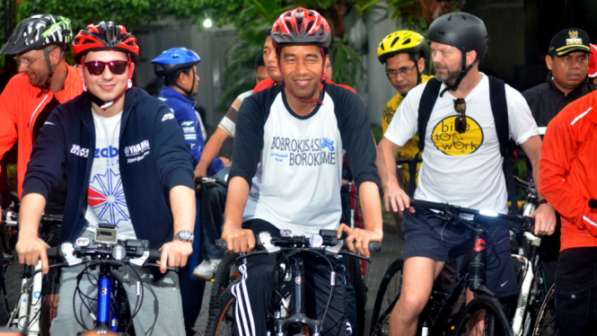 Ilustrasi Jokowi Sepeda Bareng Lorenzo