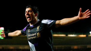 Luis Suarez saat membela Liverpool