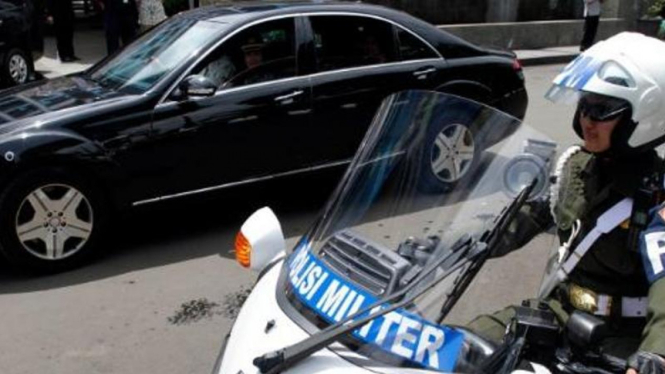 Mobil kepresidenan dikawal Paspampres.