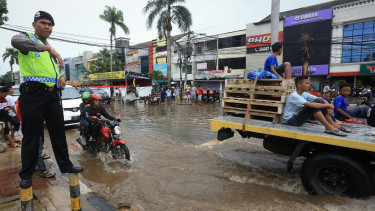 Ilustrasi/Ruas jalan tergenang banjir 