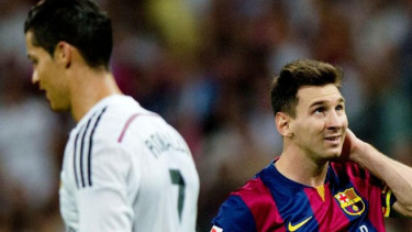 Striker Barcelona, Lionel Messi, dan pemain Real Madrid, Cristiano Ronaldo.