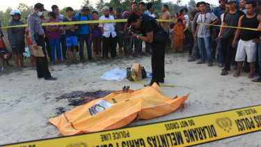 Mayat Terbakar di Pekanbaru