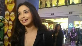 Potret Terbaru Manohara Odelia Dengan Tato di Punggung