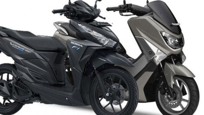 Honda Vario dan Yamaha Nmax. Dua-duanya menggunakan lampu LED.