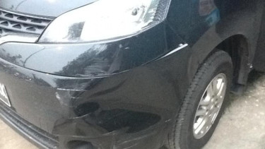 Goresan pada bodi mobil.
