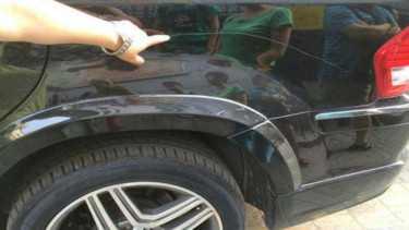 Aksi gores bodi mobil pakai paku oleh bocah 11 tahun.