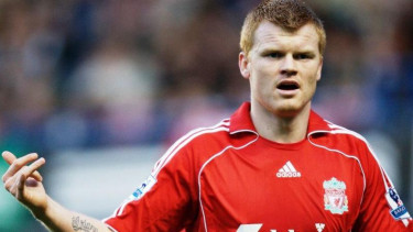 John Arne Risse kala membela Liverpool