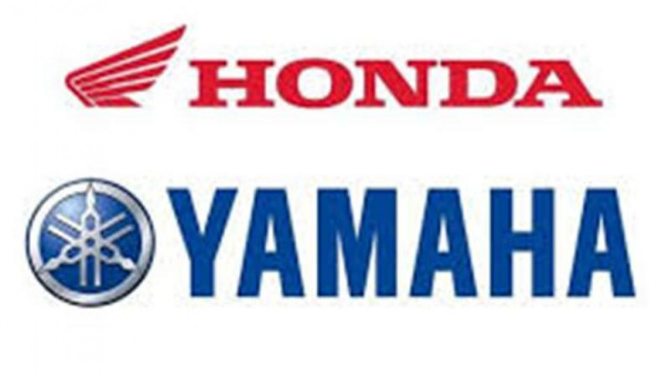Logo Honda dan Yamaha. Dua pabrikan Jepang ini dituding melakukan kartel harga skuter matik 110-125cc.