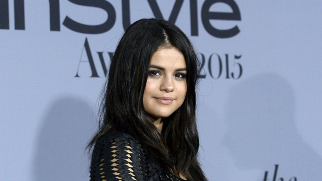 Selena Gomez dan foto mesra dengan Orlando Bloom