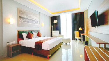 Salah satu kamar di Pasar Baru Square Hotel