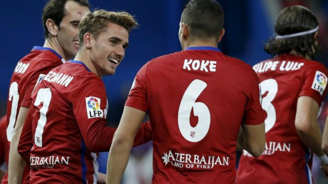 Para pemain Atletico Madrid merayakan gol