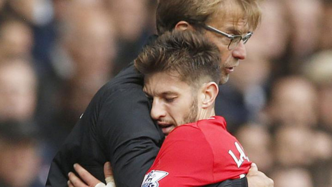 Manajer Liverpool Juergen Klopp dan Adam Lallana.
