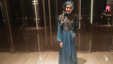 Dhini Aminarti