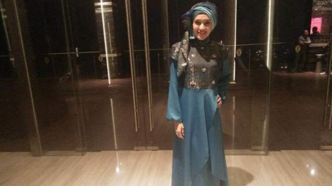 Dhini Aminarti