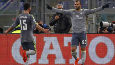 Pemain Real Madrid Jese Rodriguez merayakan gol ke gawang AS Roma.