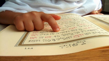 Pembaca Alquran.