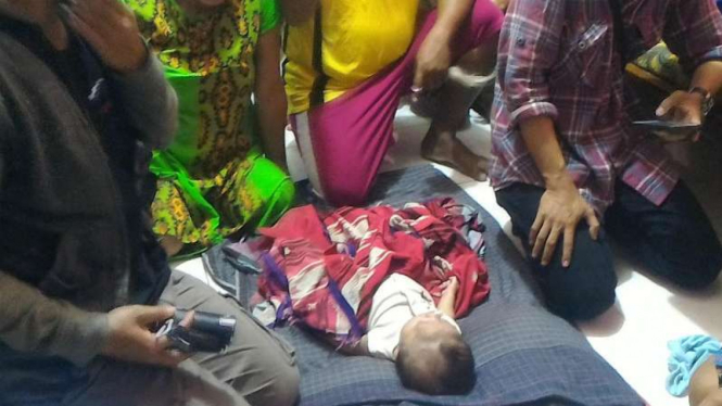 Bayi memiliki tulisan menyerupai lafadz Allah di kakinya 