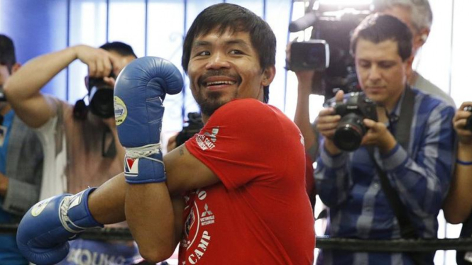 Petinju Filipina, Manny Pacquiao (kanan).