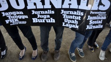 Ilustrasi/Jurnalis menggelar aksi unjuk rasa