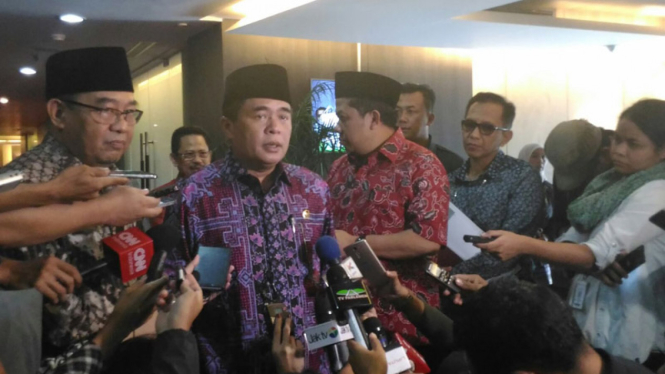 Ketua DPR RI Ade Komarudin bersama Ketua BPK Harry Azhar Azis.