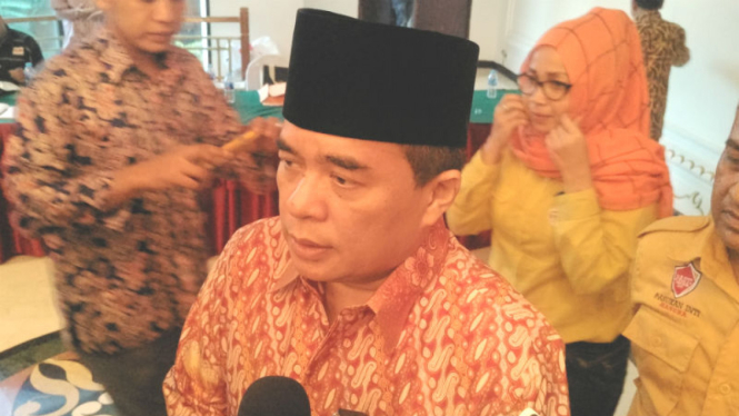 Ade Komarudin