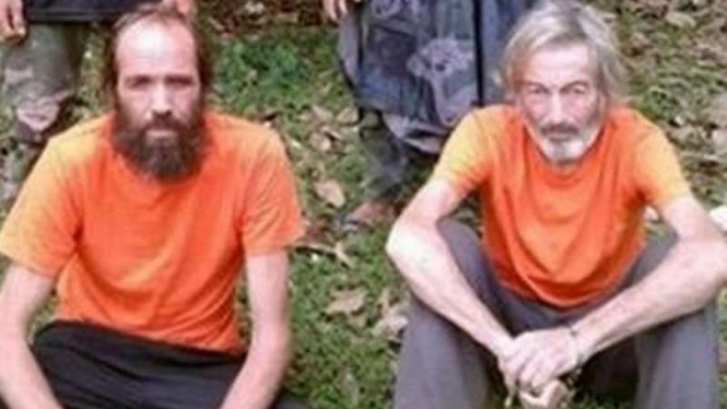 Kjartan Sekkingstad, warga Norwegia (kiri) dan Robert Hall (kanan). Hall sudah tewas dipenggal oleh Abu Sayyaf.