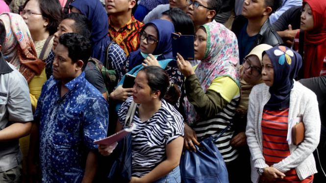 Orangtua dari anak yang memakai vaksin dari RS Harapan Bunda.