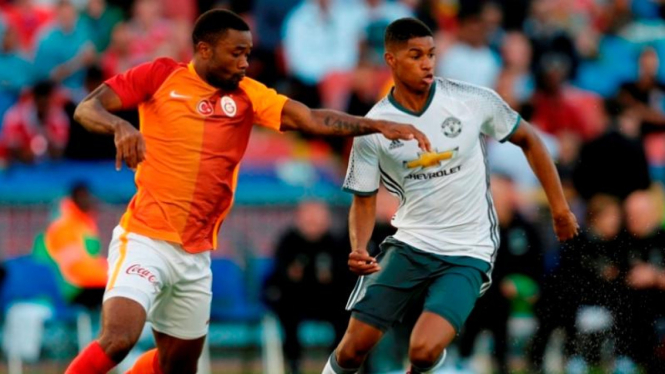 Bomber muda MU, Marcus Rashford (kanan).