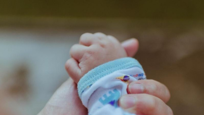 Tangan bayi. 