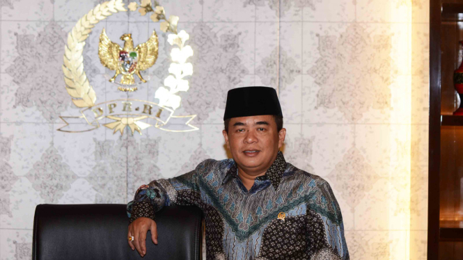 Ade Komarudin.