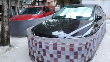 Pelindung mobil dari serangan tikus.