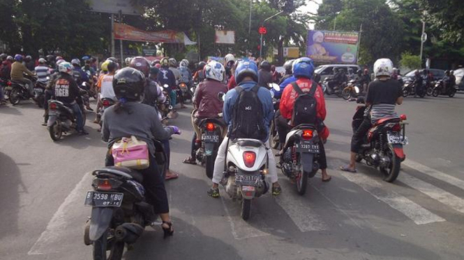 Pengendara sepeda motor. Foto ilustrasi.