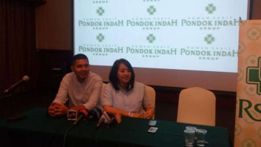 Chua Kotak dan suaminya, Firmansyah