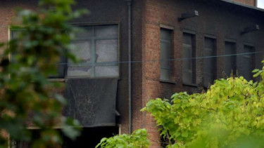 Sebagian gedung laboratorium kriminologi yang terbakar di Belgia.