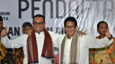 Anies Baswedan dan Sandiaga Uno.