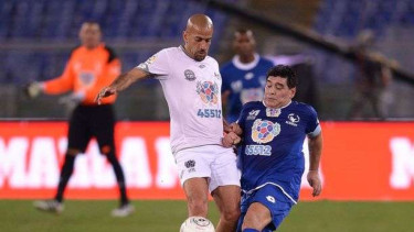 Juan Sebastian Veron (kiri)