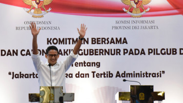 Cawagub DKI Jakarta nomor urut tiga Sandiaga Uno memberikan paparan ketika menghadiri komitmen bersama pasangan Cagub dan Cawagub DKI Jakarta.