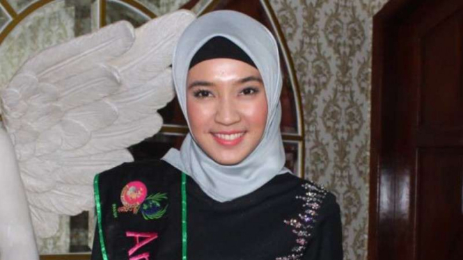 Dhini Aminarti