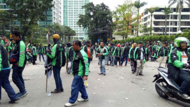 Ilustrasi demo driver Grab