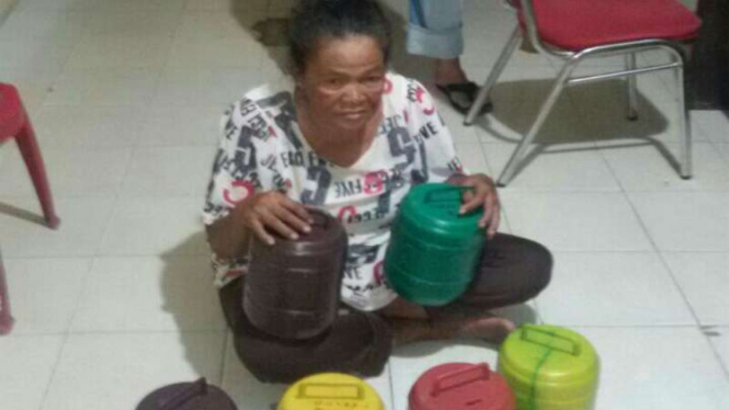 Rahmawati alias Bunda (59) mengaku bisa menggandakan uang