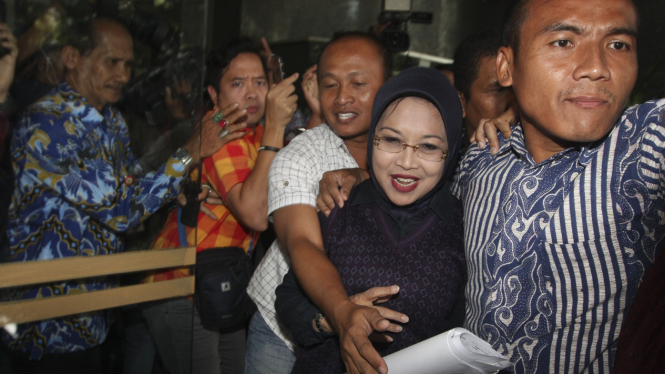Sylviana Murni ketika jalani pemeriksaan polisi.