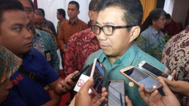 Muliaman D. Hadad. 