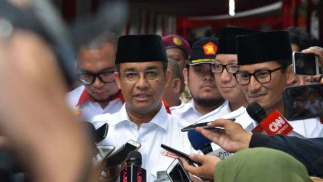 Anies Baswedan dan Sandiaga Uno.
