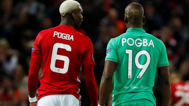 Paul Pogba bersama sang kakak, Florentin Pogba, saat saling bertanding. 